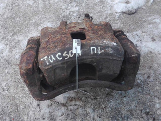 суппорт передний левый Hyundai Tucson 1 поколение 2006, 581802EA10, 581102E000