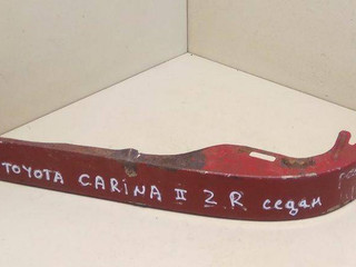 ус под фонарь правый Toyota Carina T170 1990