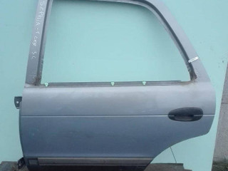 стеклоподъемник электрический задний левый Kia Sephia 1 поколение 1994, 1.5 л., i, B5, бензин, МКПП, передний привод, 0K20173560