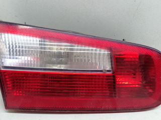 фонарь крышки багажника левый Renault Laguna 2 поколение 2001, 1.8 л., i, F4P 770, бензин, 5МКПП, серебристый, хетчбэк 5 дв., передний привод, 8200002475