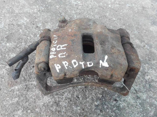 скоба суппорта Proton Satria 1 поколение 1998, 1.5 л., i, бензин