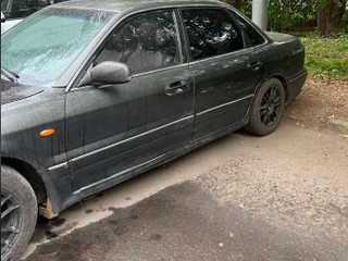 Mitsubishi Sigma 1 поколение