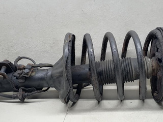 стойка передняя левая Mitsubishi Sigma 1 поколение 1994, 3.0 л., i, 6G72 (DOHC 24V), бензин, 5МКПП, серый металлик, седан, передний привод