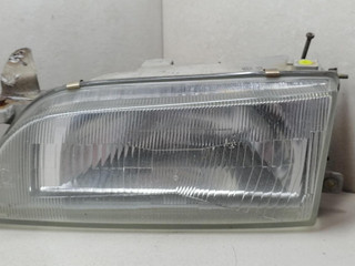 фара левая Toyota Corolla 7 поколение (E100) EE101 1996, 1.3 л., 4E-FE, бензин, хетчбэк 3 дв.