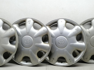 колпак колесный Toyota Corolla 7 поколение (E100) EE101 1996, 1.3 л., 4E-FE, бензин, хетчбэк 3 дв.