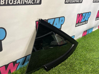 стекло кузовное заднее левое