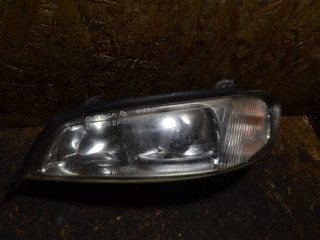 фара левая Opel Omega B [рестайлинг] 2001, 4421124L
