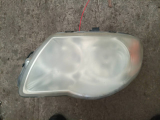 фара левая Chrysler Voyager 4 поколение (2001 - 2004), 04857831AB