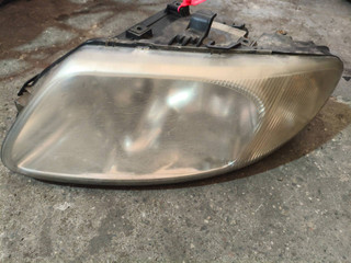 фара левая Chrysler Voyager 4 поколение (2001 - 2004), 04857703AB