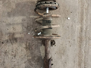 стойка передняя левая Chrysler Voyager 3 поколение (1995 - 2001), 2.5 л., дизель