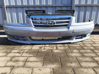 бампер передний Hyundai Trajet 1 поколение [рестайлинг] (2004 - 2007)
