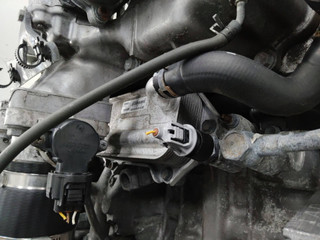 теплообменник масляного фильтра Toyota Auris 1 поколение 2007, 2.0 л., дизель, МКПП, 15710-0F010-00