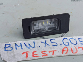 подсветка номера BMW X5 G05 [рестайлинг] 2023, 4.4 л., S68B44A, бензин, c4p, 9481841