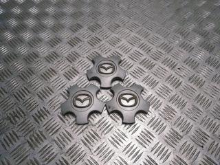 колпачок литого диска Mazda 3 1 поколение [рестайлинг] BK 2007, 1.6 л., i, Z6, бензин, 5МКПП, голубой, хетчбэк 5 дв., передний привод, правый руль