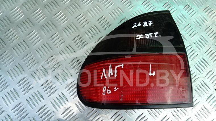 фонарь задний левый Renault Laguna 1 поколение 1996, 1.8 л., бензин, МКПП, хетчбэк 5 дв. - фото №1