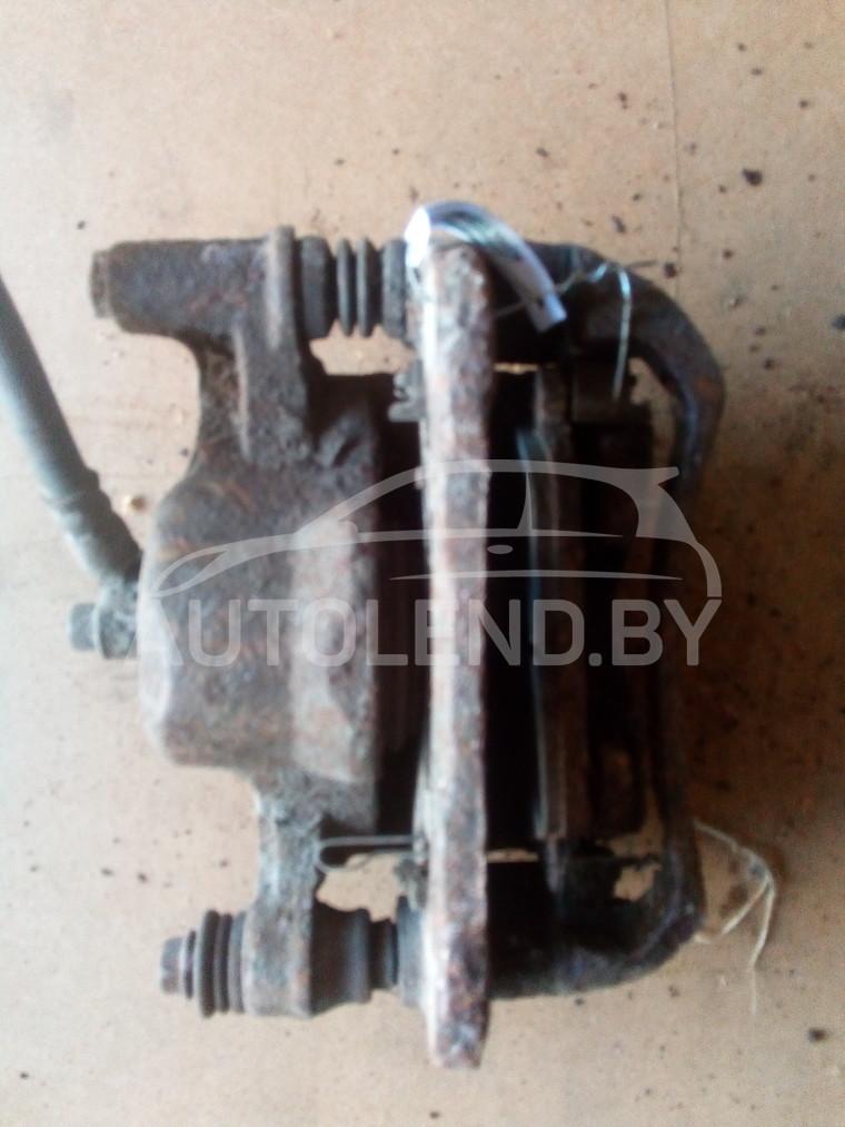 суппорт передний правый Hyundai Accent 1 поколение (X3) 1995, 1.3 л., бензин, МКПП, хетчбэк 5 дв. - фото №1
