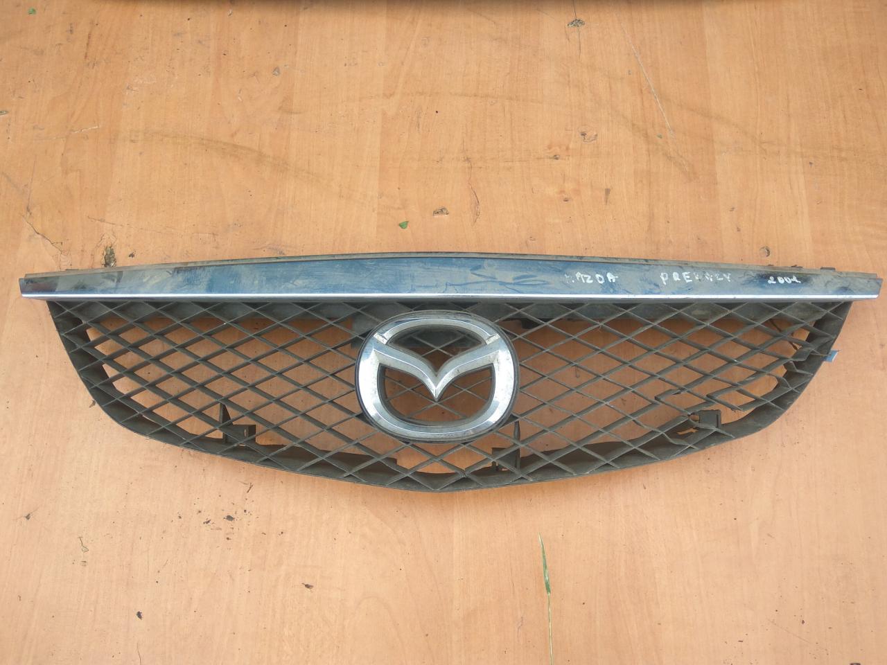 решетка радиатора Mazda Premacy 1 поколение 2001, 2.0 л., бензин, МКПП, минивэн - фото №1
