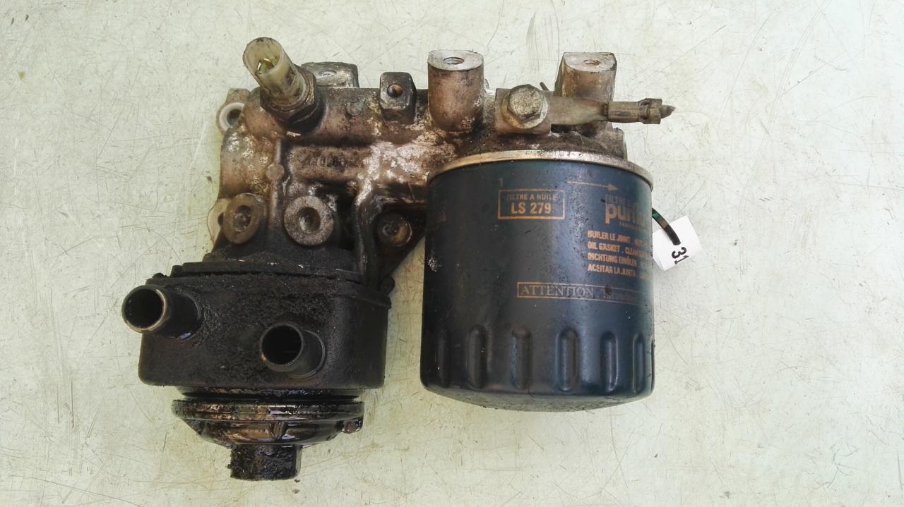 корпус масляного фильтра Renault Laguna 1 поколение 1997, 2.2 л., дизель, МКПП, хетчбэк 5 дв. - фото №1