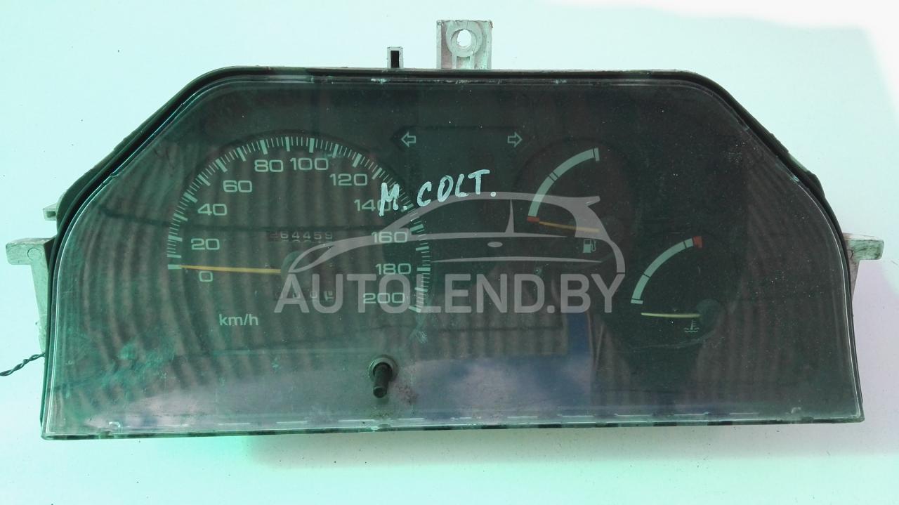 щиток приборов (приборная панель) Mitsubishi Colt 3 поколение 1990, 1.3 л., бензин, МКПП, хетчбэк 5 дв. - фото №1