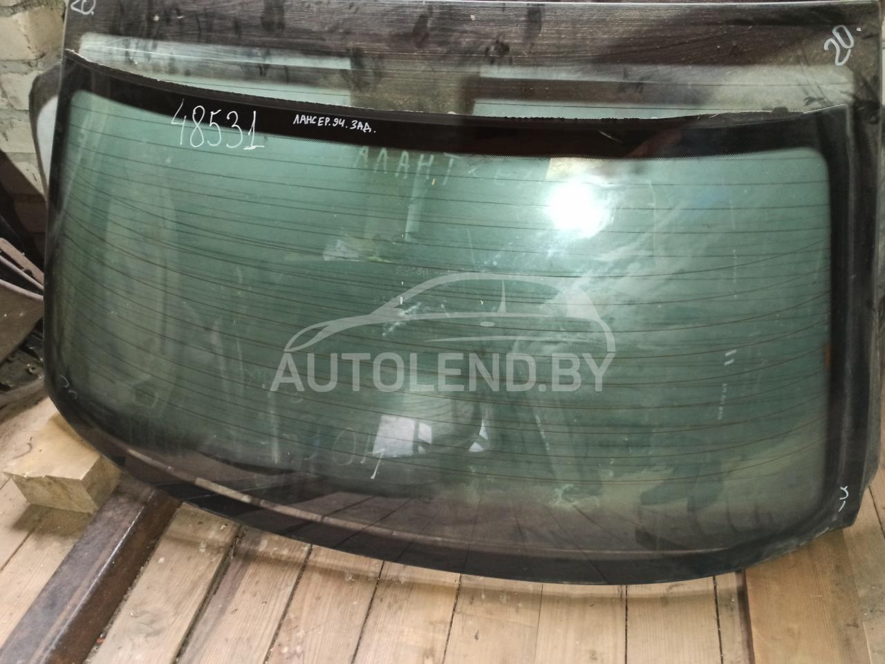 стекло заднее Mitsubishi Lancer 5 поколение 1994, 1.6 л., бензин, МКПП, седан - фото №1