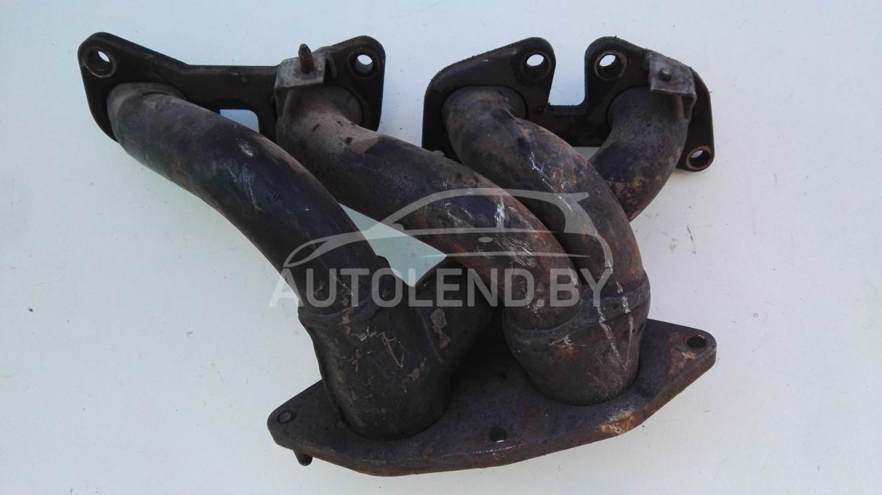 коллектор выпускной Fiat Stilo 1 поколение 2004, 1.8 л., бензин, МКПП, хетчбэк 5 дв. - фото №1