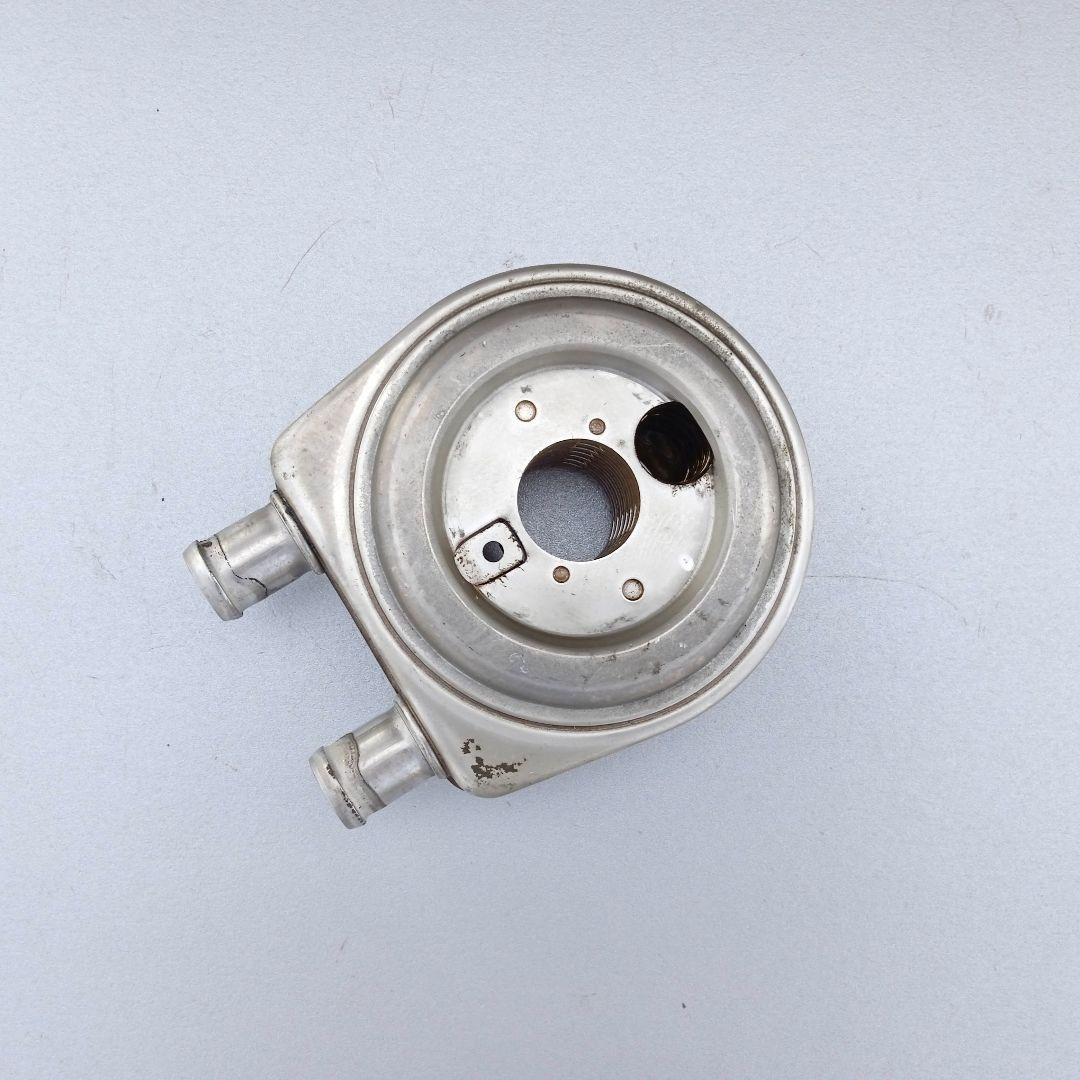 теплообменник масляного фильтра Hyundai Matrix 1 поколение 2002, 1.5 л., D3EA, дизель, МКПП, хетчбэк 5 дв., 28400-27500 - фото №1