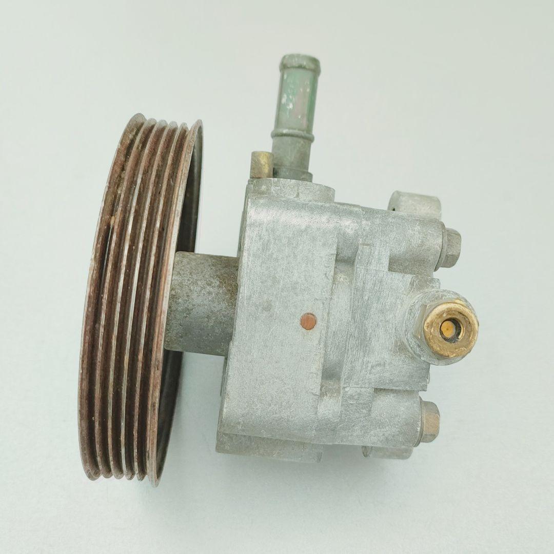насос гидроусилителя руля Mazda 323 6 поколение (1998 - 2001), 2.0 л., бензин, МКПП, хетчбэк 5 дв. - фото №1