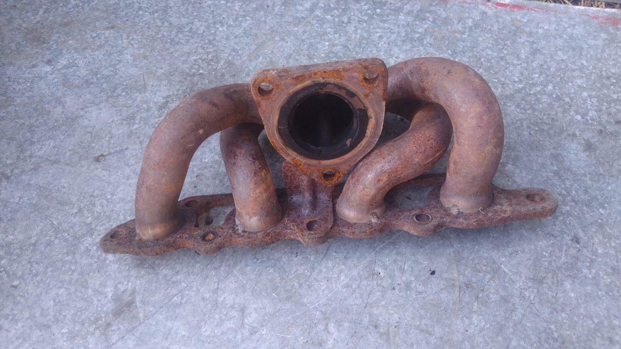 коллектор выпускной Ford Tourneo Connect 1 поколение (2002 - 2009), 1.8 л., бензин, XS4Z9430AA - фото №1