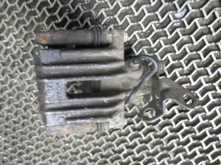 суппорт задний левый Volkswagen Golf 4 поколение 2004