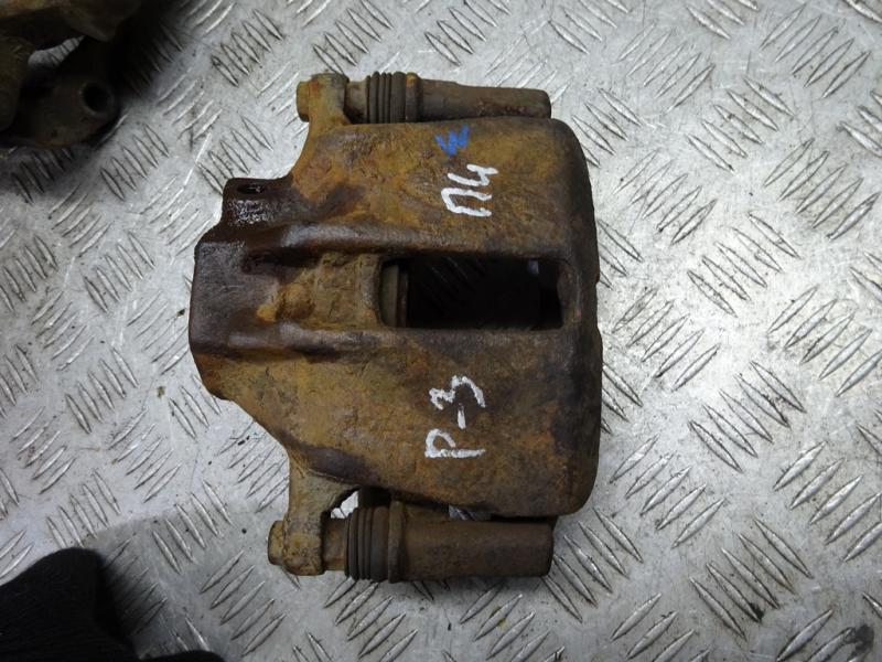 суппорт передний левый Volkswagen Passat B3 1990 - фото №1