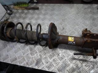 стойка передняя левая Mazda 323 6 поколение 1999, 1.3 л., бензин, МКПП, хетчбэк 5 дв.