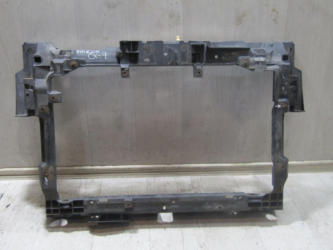 передняя панель крепления облицовки (телевизор) Mazda CX-7 1 поколение (2006 - 2009), L20653110D, L20653110E, L20653110F, L20653110G, L20653110, EH1053110B, EH1053110A, EH4453110 - фото №1
