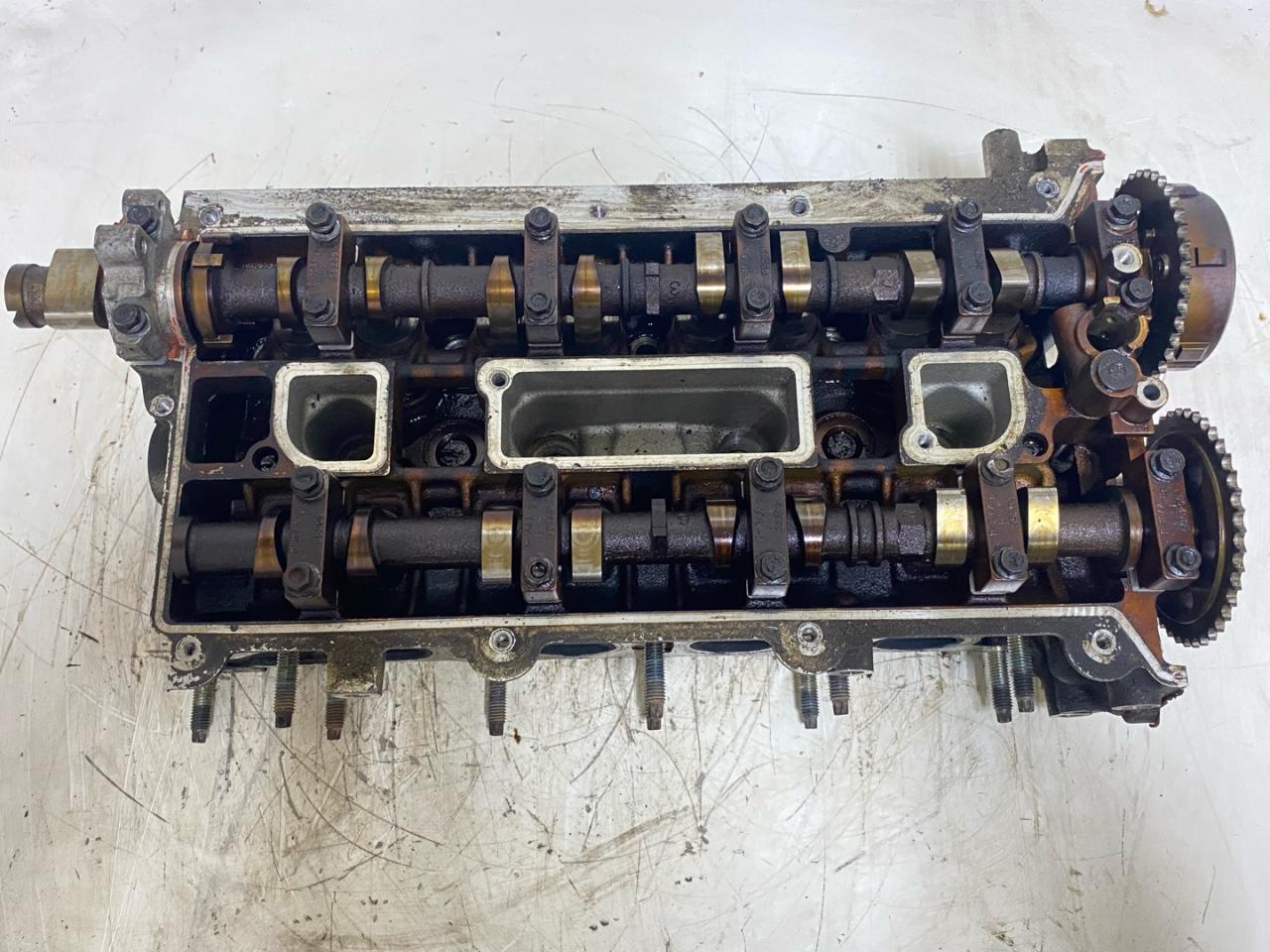 головка блока цилиндров Mazda CX-7 1 поколение (2006 - 2009), 2.3 л., L3-VDT, бензин, L3K910090G, L3K910090F - фото №1