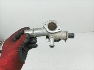 корпус термостата Volkswagen Golf 4 поколение 2004, 1.9 л., TDi PD, AXR, дизель, МКПП, универсал, 038121133A