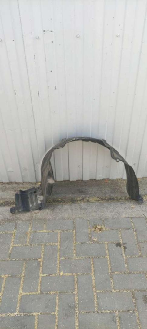 защита арок передняя левая (подкрылок) Nissan Almera N16 2002, 1.5 л., бензин, МКПП, седан - фото №1