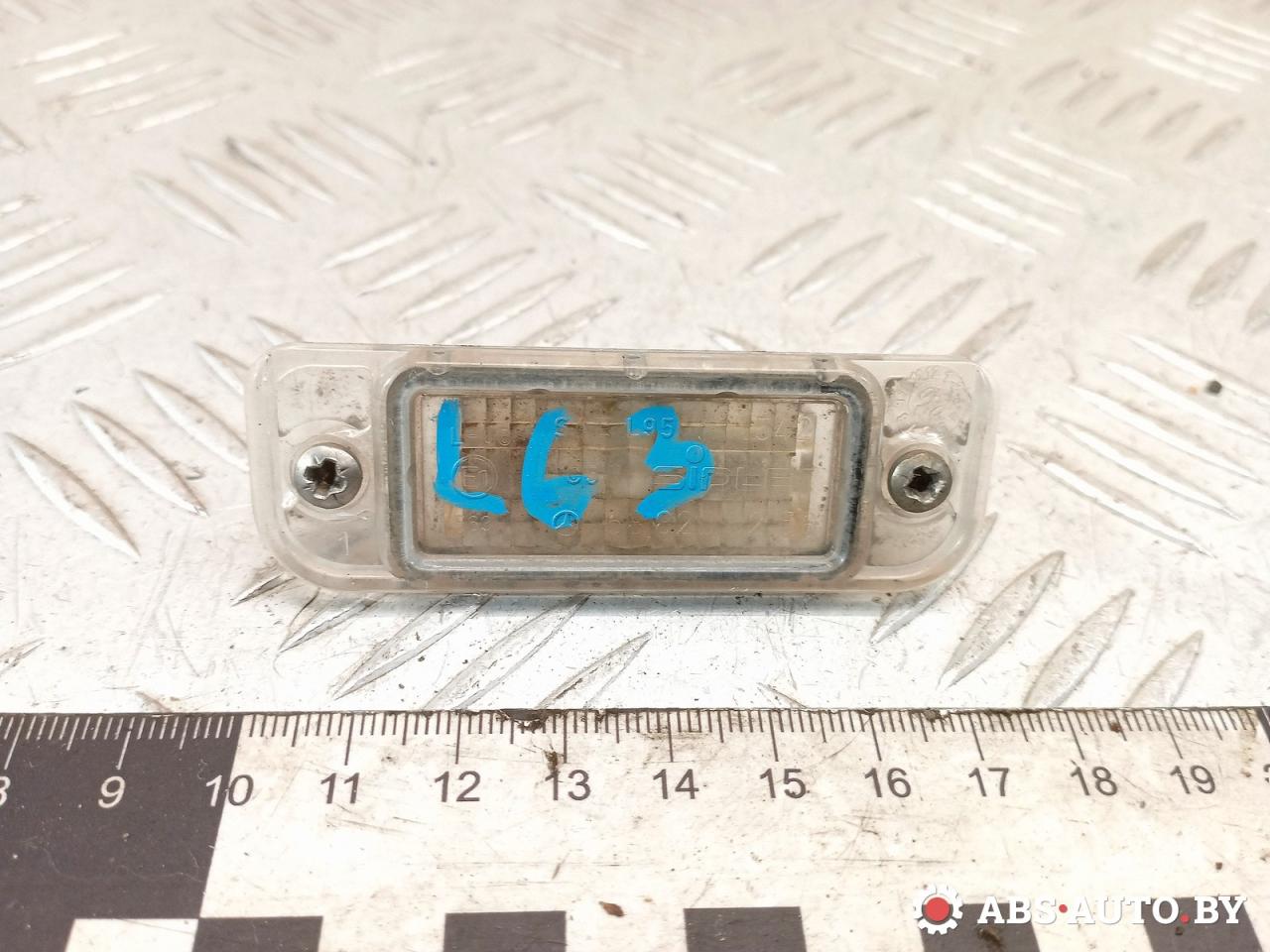 подсветка номера Mercedes-Benz A W168 1 поколение (1997-2001) 2001, 1.4 л., бензин, АКПП, хетчбэк 5 дв., 1688200256, A1688200256 - фото №1