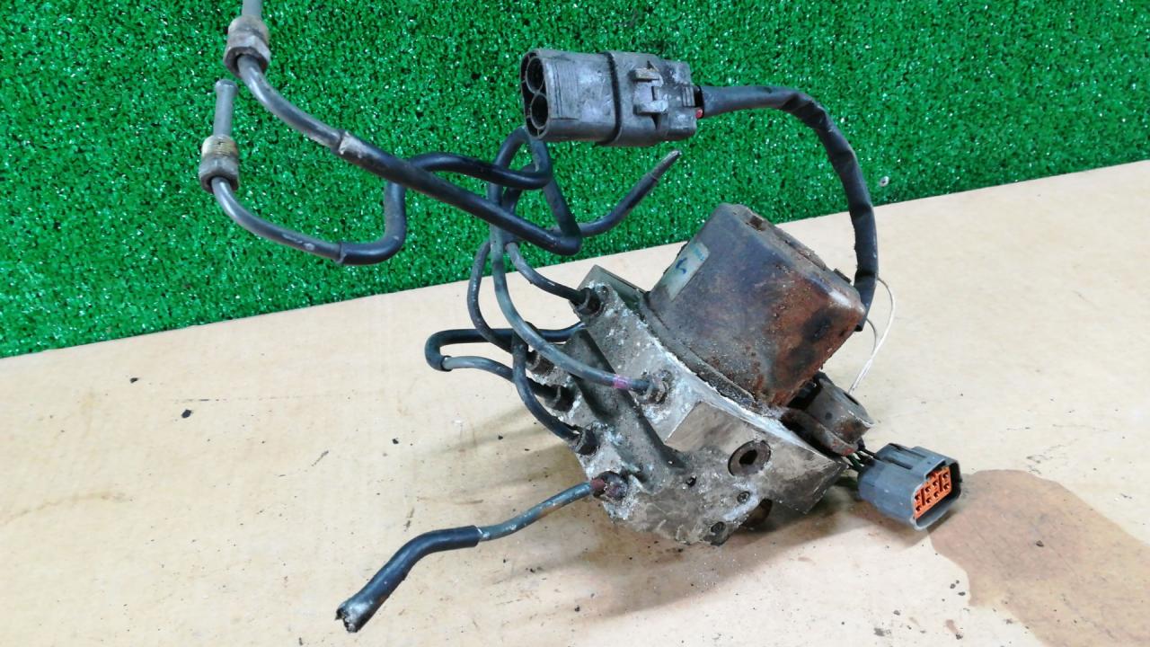 блок ABS Mazda Millenia 1 поколение 1998, 2.3 л., бензин - фото №1