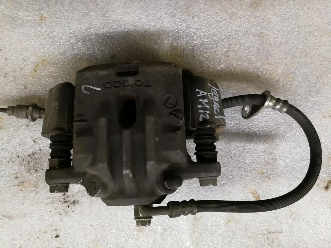 суппорт задний левый Subaru Legacy 5 поколение 2012, 2.5 л., EJ253, бензин, АКПП, универсал - фото №1