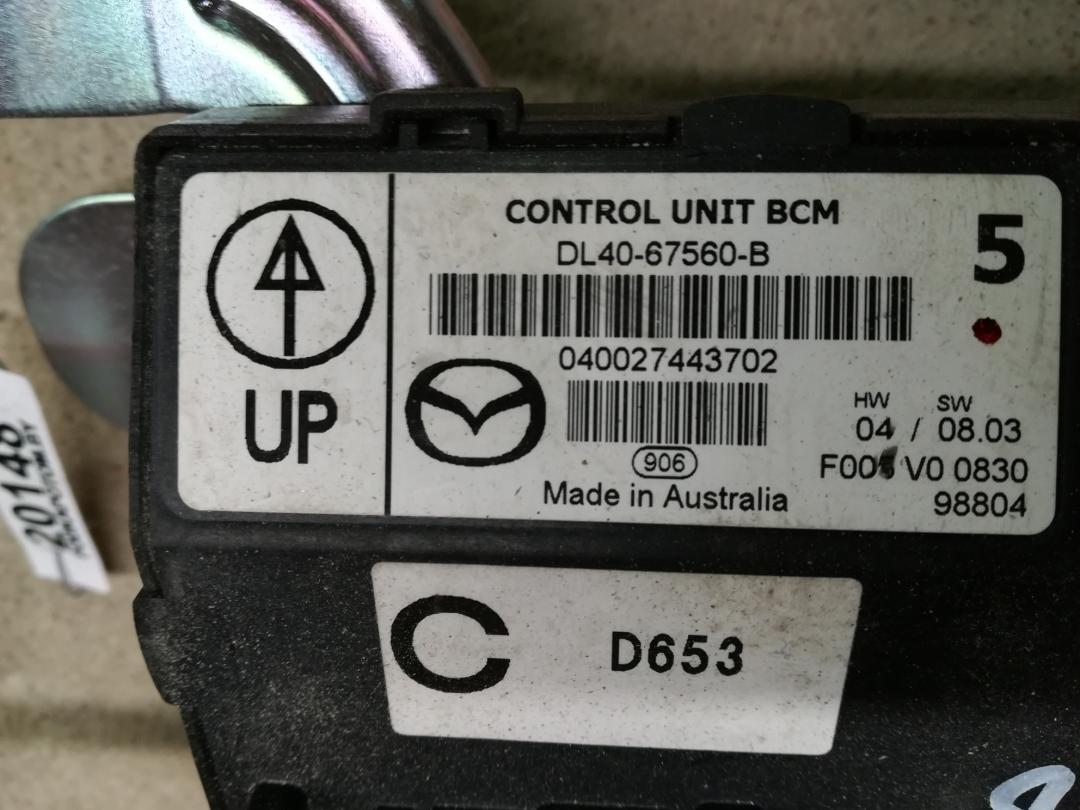 блок комфорта Mazda 2 DE 2008, 1.3 л., ZJ-VE, бензин, АКПП, серебристый, хетчбэк 5 дв., правый руль, DL40-67560-B - фото №1