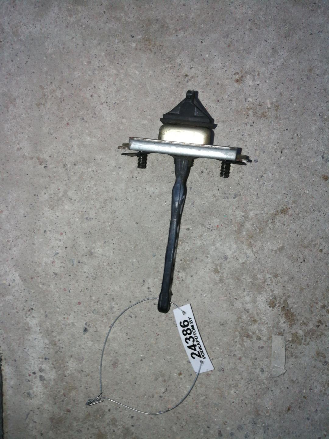 ограничитель открывания двери Mazda 323 6 поколение 1998, 1.5 л., бензин, АКПП, черный, хетчбэк 5 дв., правый руль - фото №1