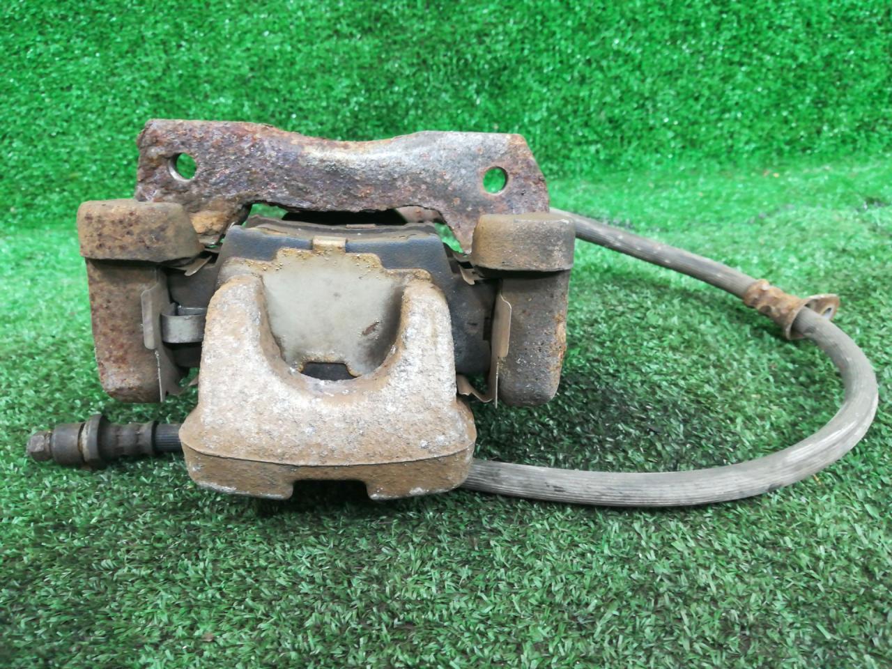 суппорт задний левый Toyota Camry 7 поколение XV40 ASV40 2009, 3.5 л., 2GR-FE, бензин, АКПП, серый, седан, передний привод - фото №1