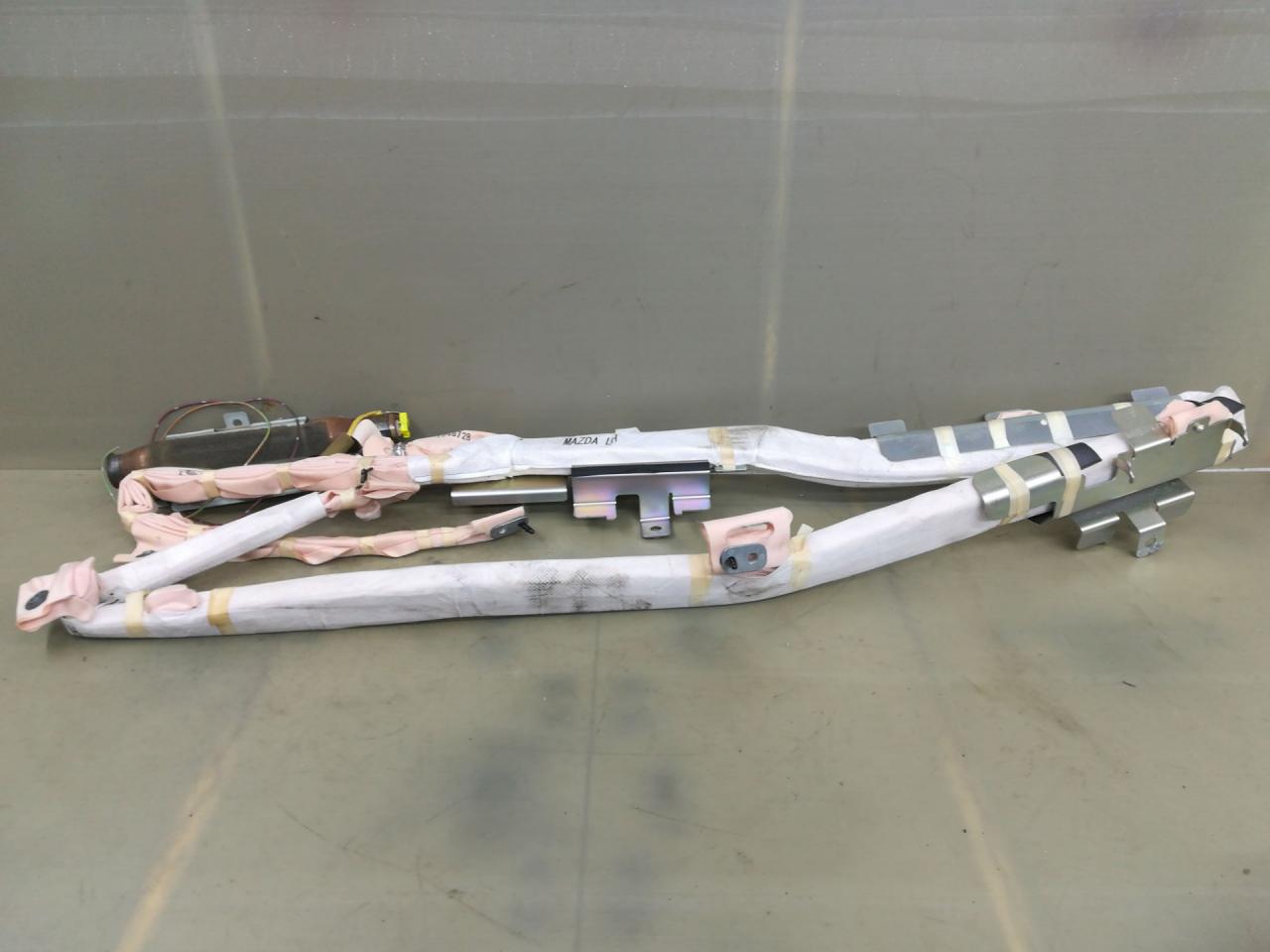 подушка безопасности боковая (шторка) Mazda CX-7 1 поколение 2007, 2.3 л., L3-VDT, бензин, АКПП, красный, внедорожник 5 дв., полный привод, 1048728 - фото №1