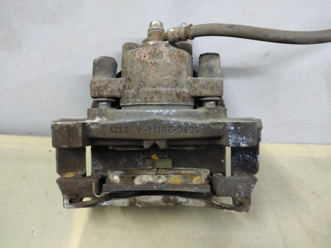 суппорт передний правый Ford Fusion (USA) 2 поколение 2013, 1.6 л., бензин, АКПП, белый перламутр, седан, передний привод, DG9C2B134A, DG9C2B134A0329 - фото №1