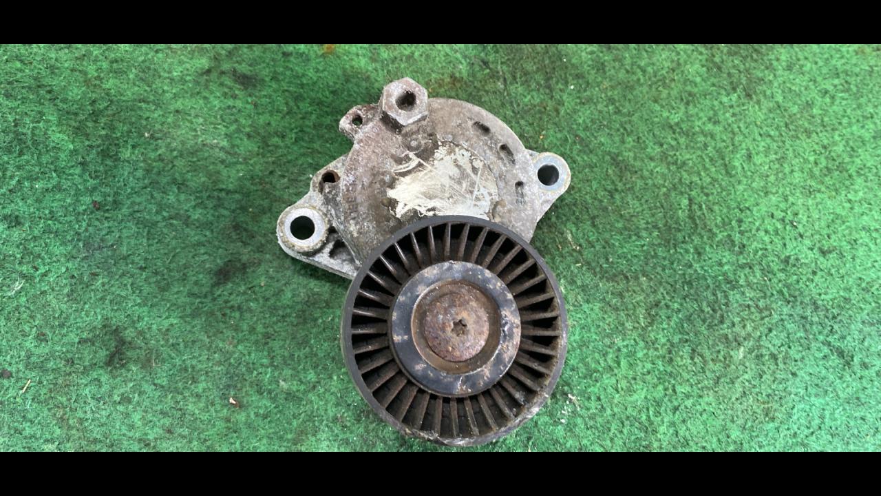 Натяжитель ремня агрегатов Mitsubishi Outlander 2 поколение 2008, 3.0 л., i, 6B31, бензин, красный, внедорожник 5 дв., полный привод - фото №1