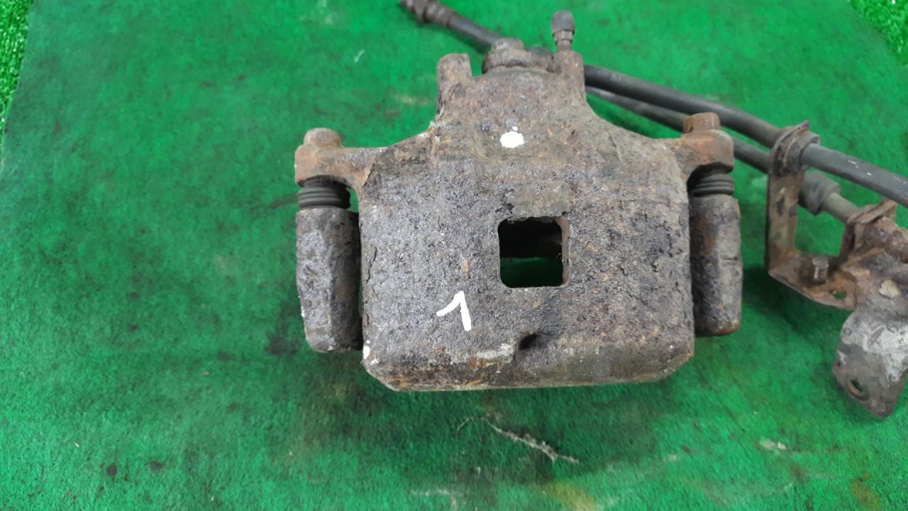 суппорт передний левый Mitsubishi Outlander 2 поколение 2008, 3.0 л., i, 6B31, бензин, красный, внедорожник 5 дв., полный привод - фото №1