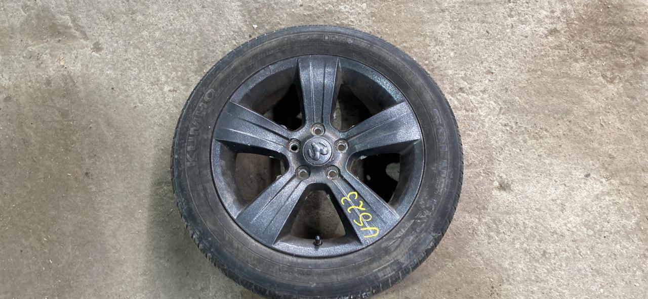 диск литой Dodge Caliber 1 поколение 2009 - фото №1