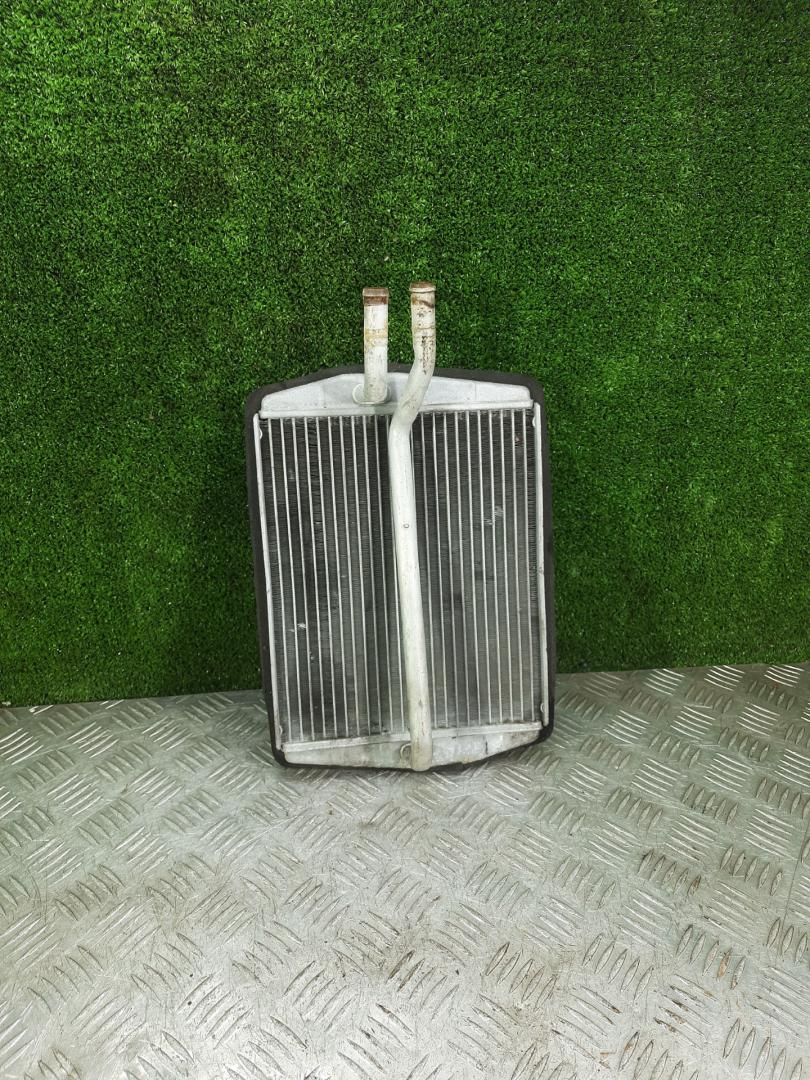 радиатор отопителя (печки) Ford Fiesta 4 поколение 1997, 1.3 л., бензин, МКПП, хетчбэк 5 дв. - фото №1