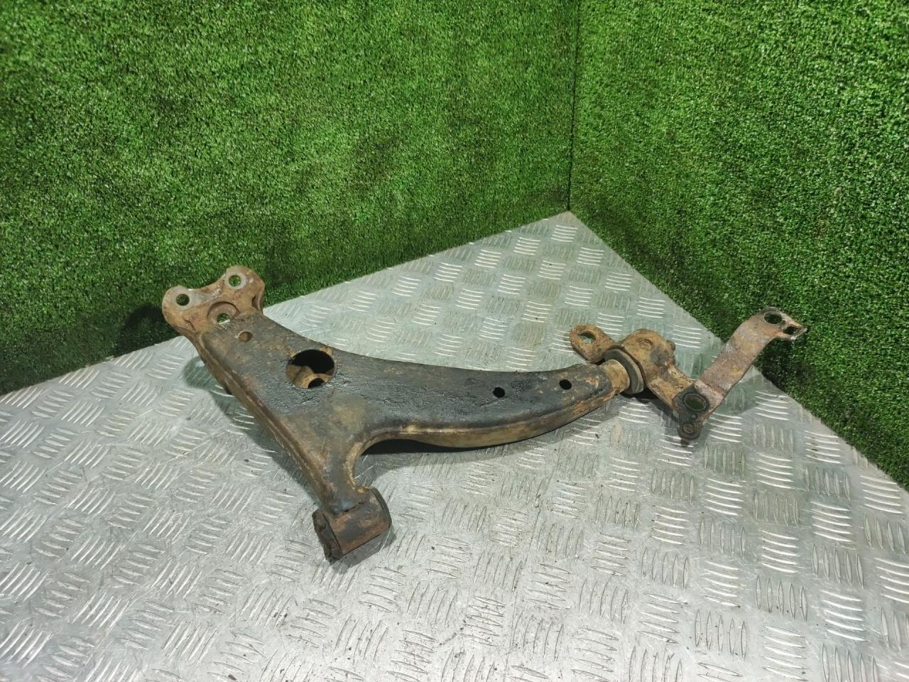 рычаг передний левый Toyota Corolla 7 поколение (E100) 1997, 1.3 л., 4E-FE, бензин, МКПП, хетчбэк 3 дв. - фото №1