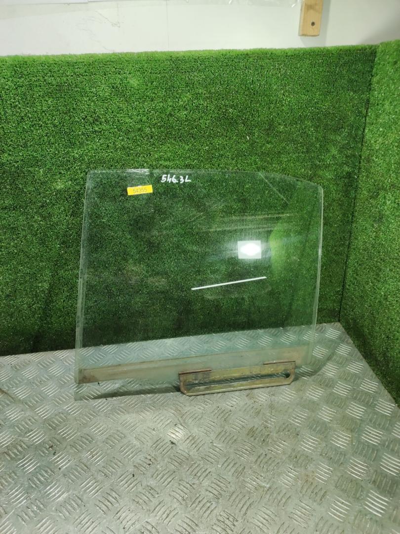 стекло двери задней левой Mazda 323 6 поколение 2000, 1.5 л., бензин, МКПП, седан - фото №1