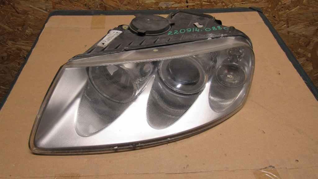 фара левая Volkswagen Touareg 1 поколение 2003, 3.2 л., бензин, АКПП, внедорожник 5 дв., 7L694105AM - фото №1